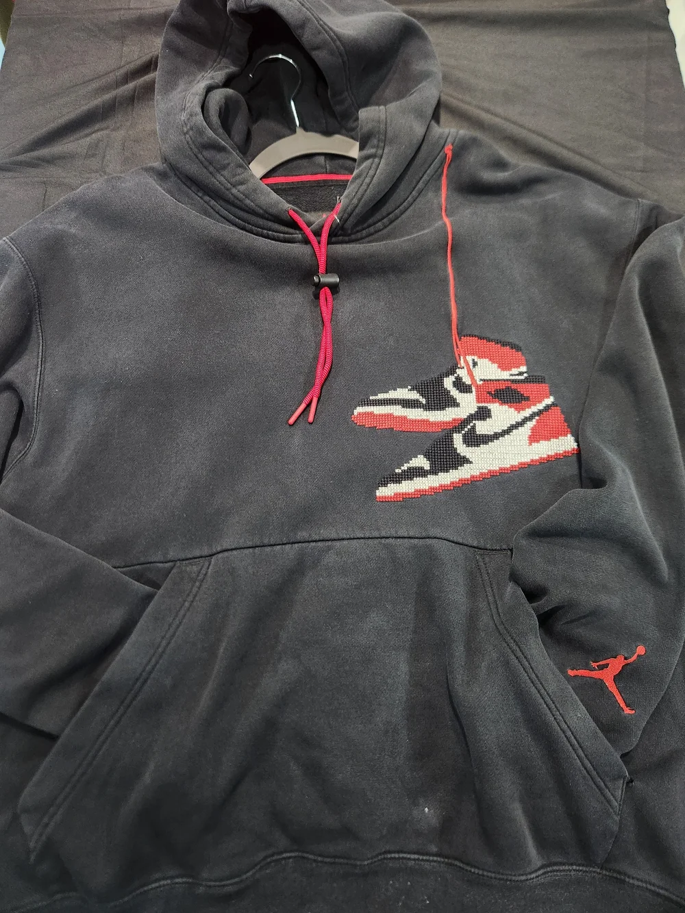 Jordan Black Hoodie with Red and White Sneaker Graphic